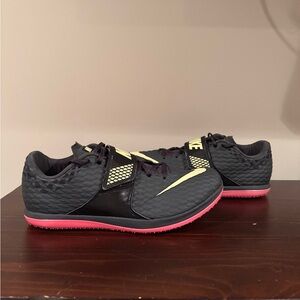 Size 12 - Nike High Jump Elite 'Anthracite
Light Lemon Pink'
